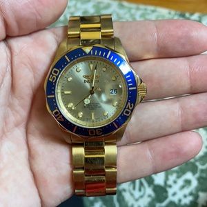 Gold Invicta Pro Diver watch